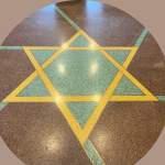 The mosaic Star of David in the Har Zion lobby