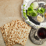 Seder plate, wine, and matzoh.